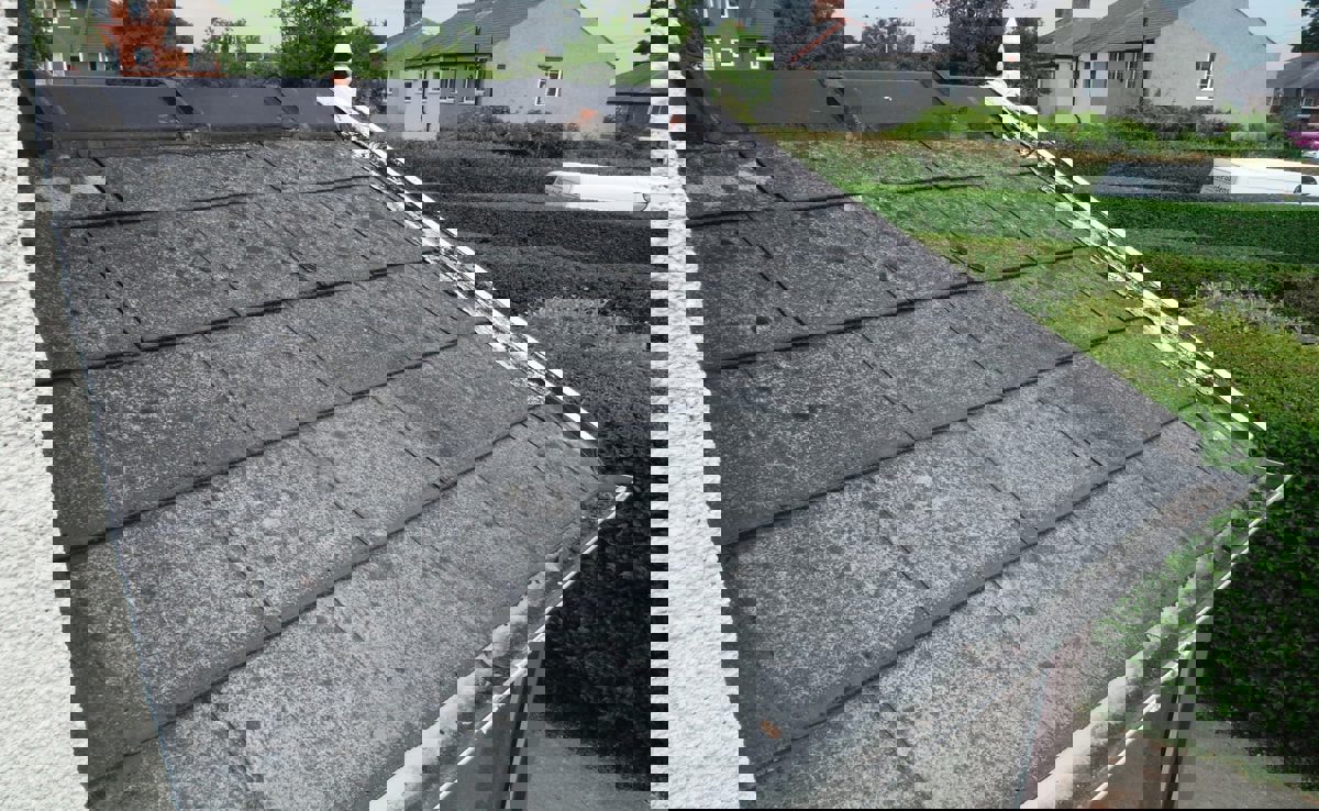 Asbestos-containing panels in a residential front porch canopy