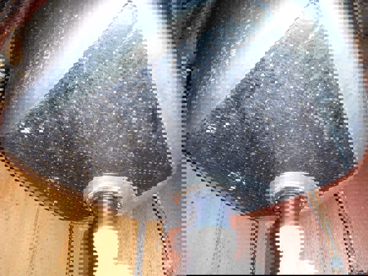 Asbestos floor tiles and sink surround area identified in survey